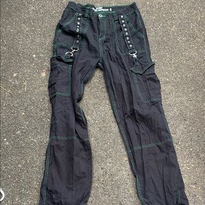 Black Pants with Green Stitching and Metal Accents